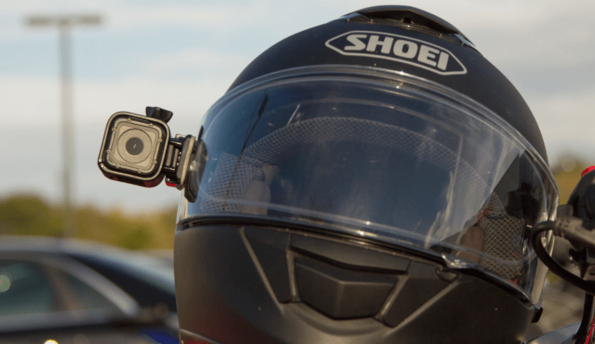 gopro mounted on the side of a motorcycle helmet