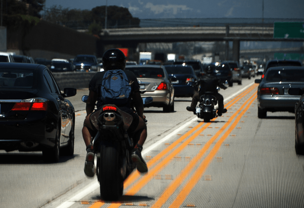 motorcycle filtering through traffic
