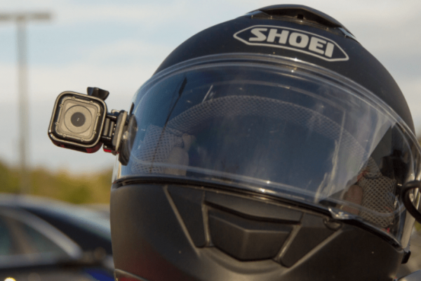 gopro mounted on the side of a motorcycle helmet